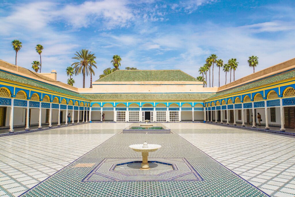 Explore the beautiful courtyard of Bahia Palace in Marrakesh, Morocco, with elegant architecture.